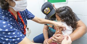 Girl getting measles vaccination