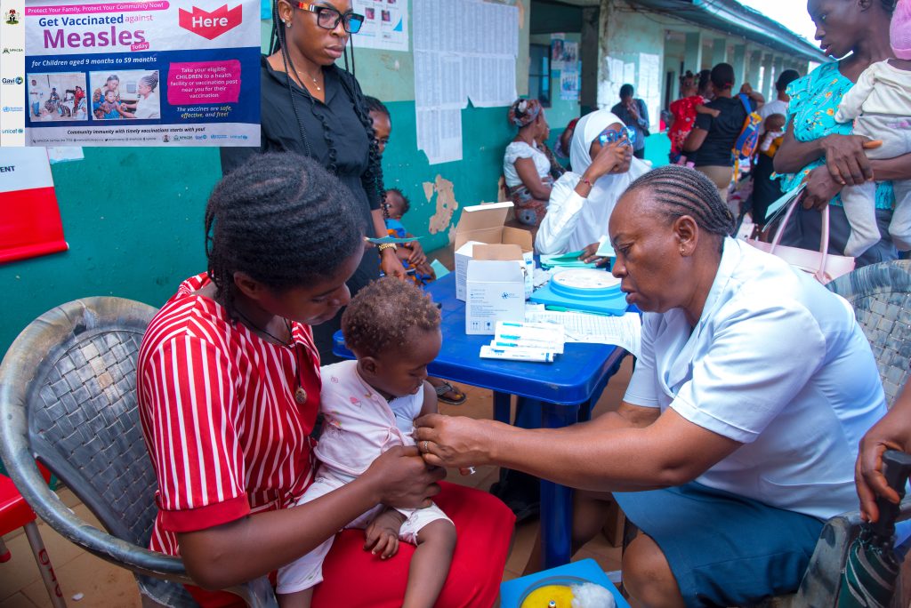 14-month-old baby vaccinated against measles